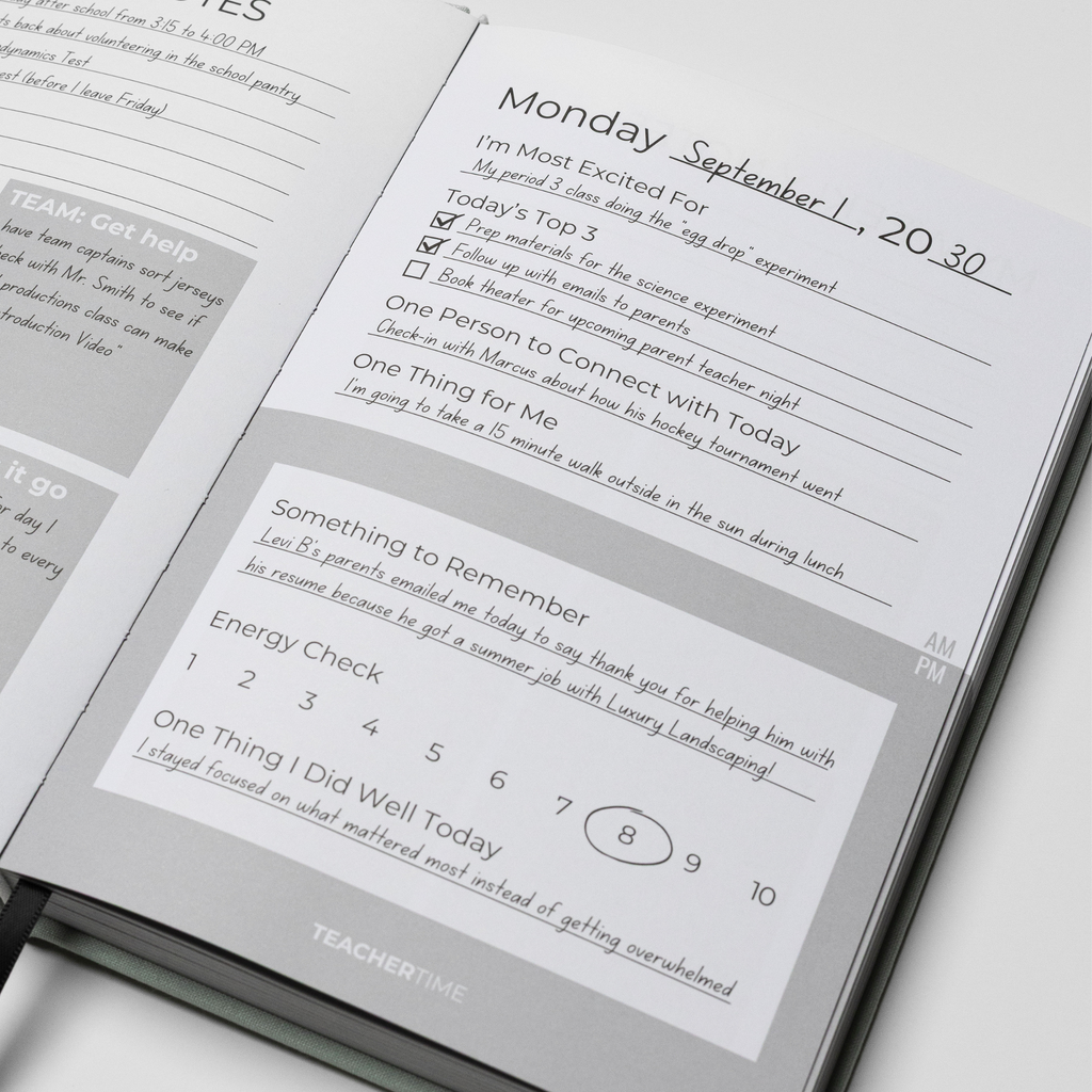 An open TeacherTime daily planner showing a Monday schedule page with lined writing sections, checkboxes, and a 'Something to Remember' box, photographed on a white background.